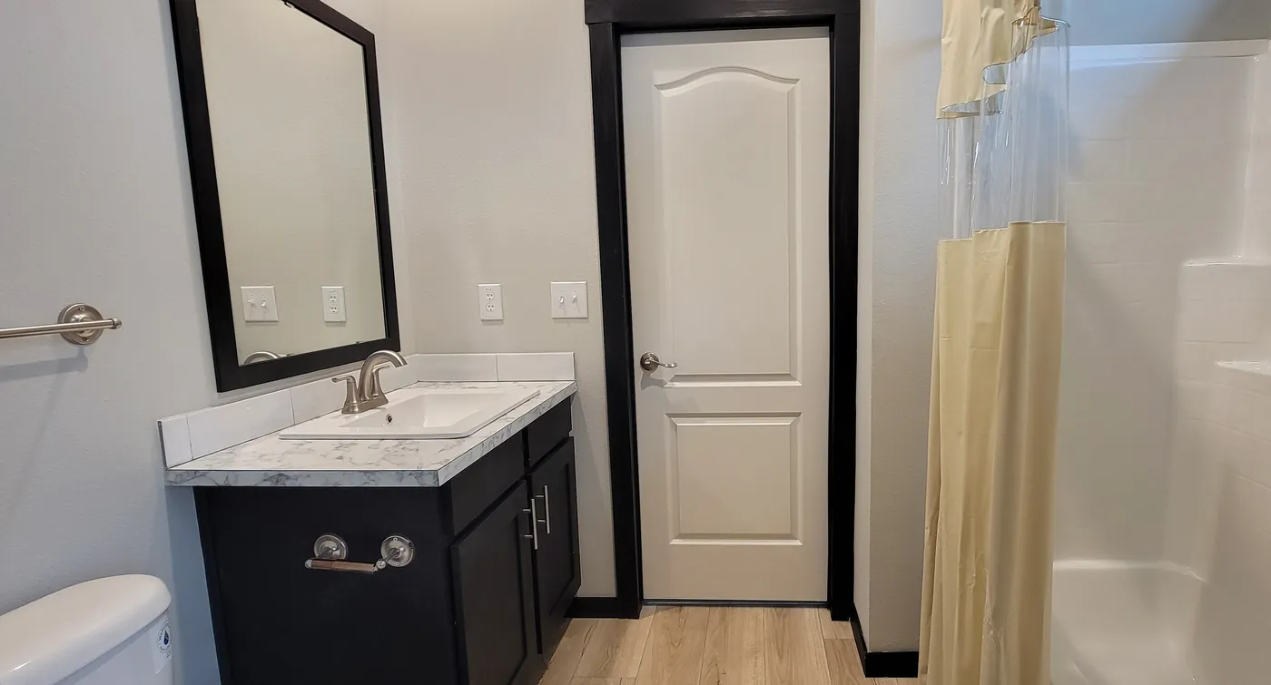 Jack and Jill bath between third and forth bedroom.
