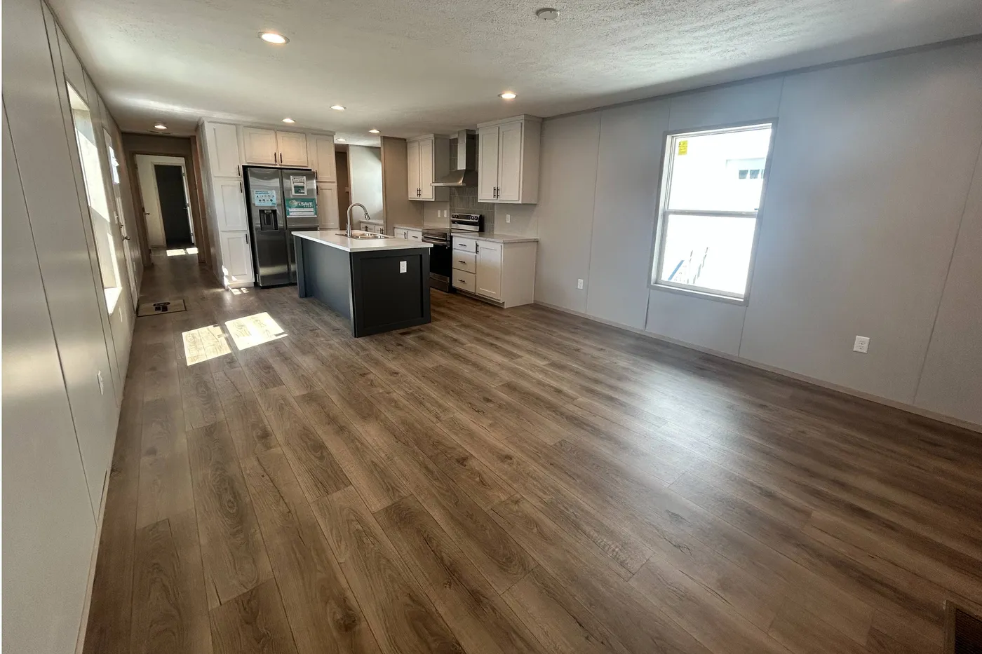 The view of the kitchen from standing in the Family room. 