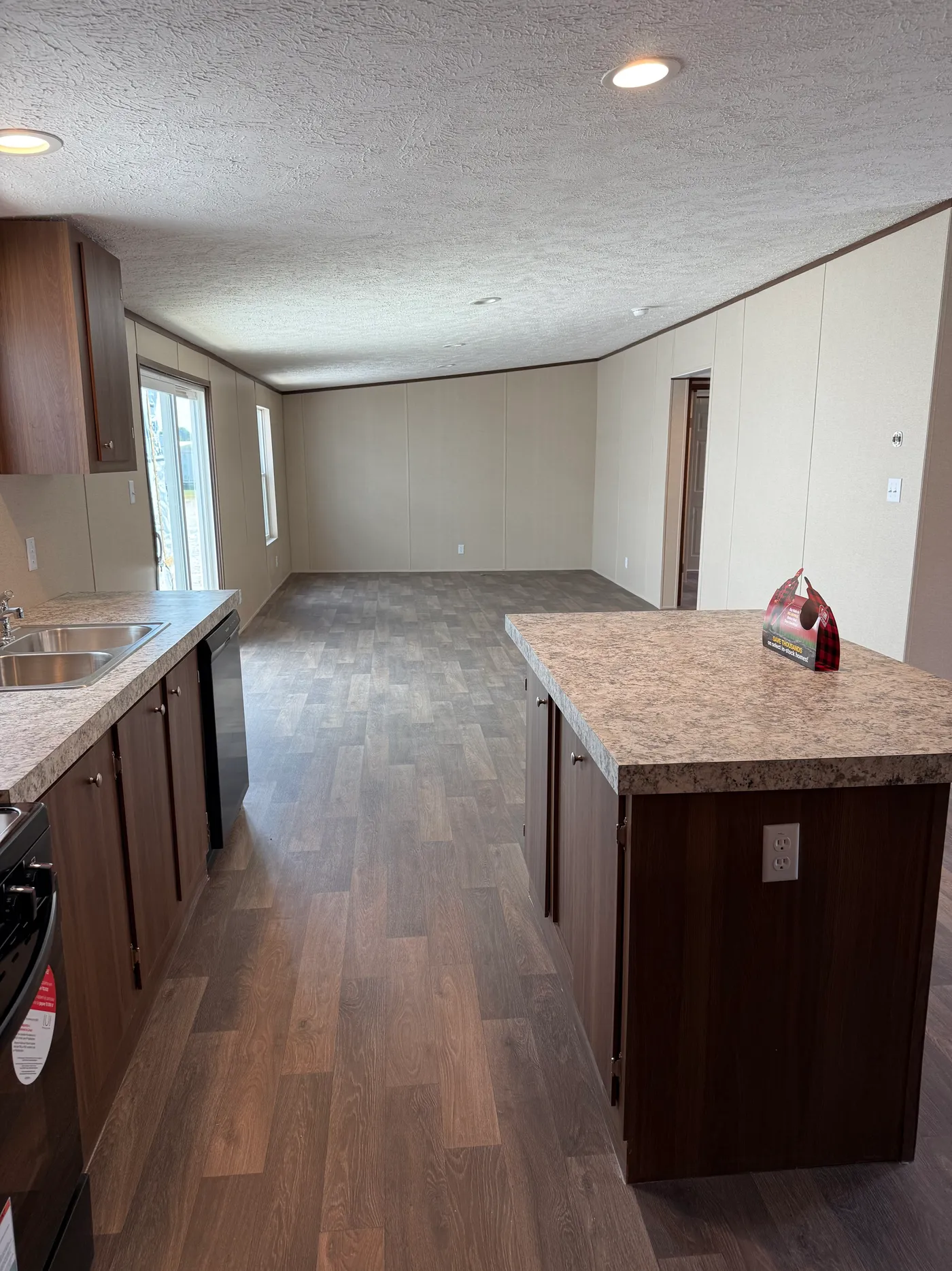 Open floor plan kitchen dining room and living room.