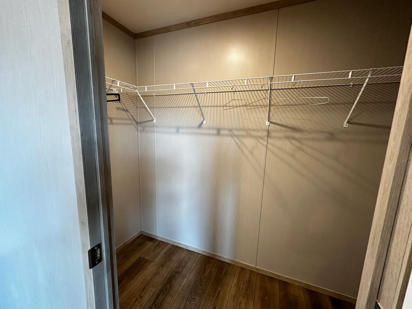 Spacious 3 bedroom, 2 bathroom double wide manufactured home built for comfort and family living. This open layout features both a living room and separate den, perfect for movie nights, entertaining, or creating private space for kids and adults. The modern kitchen includes stainless steel appliances and ample cabinet space. Enjoy year-round comfort with energy-efficient upflow ceiling vents for improved airflow. The private primary suite offers a relaxing retreat with a large soaking tub and s