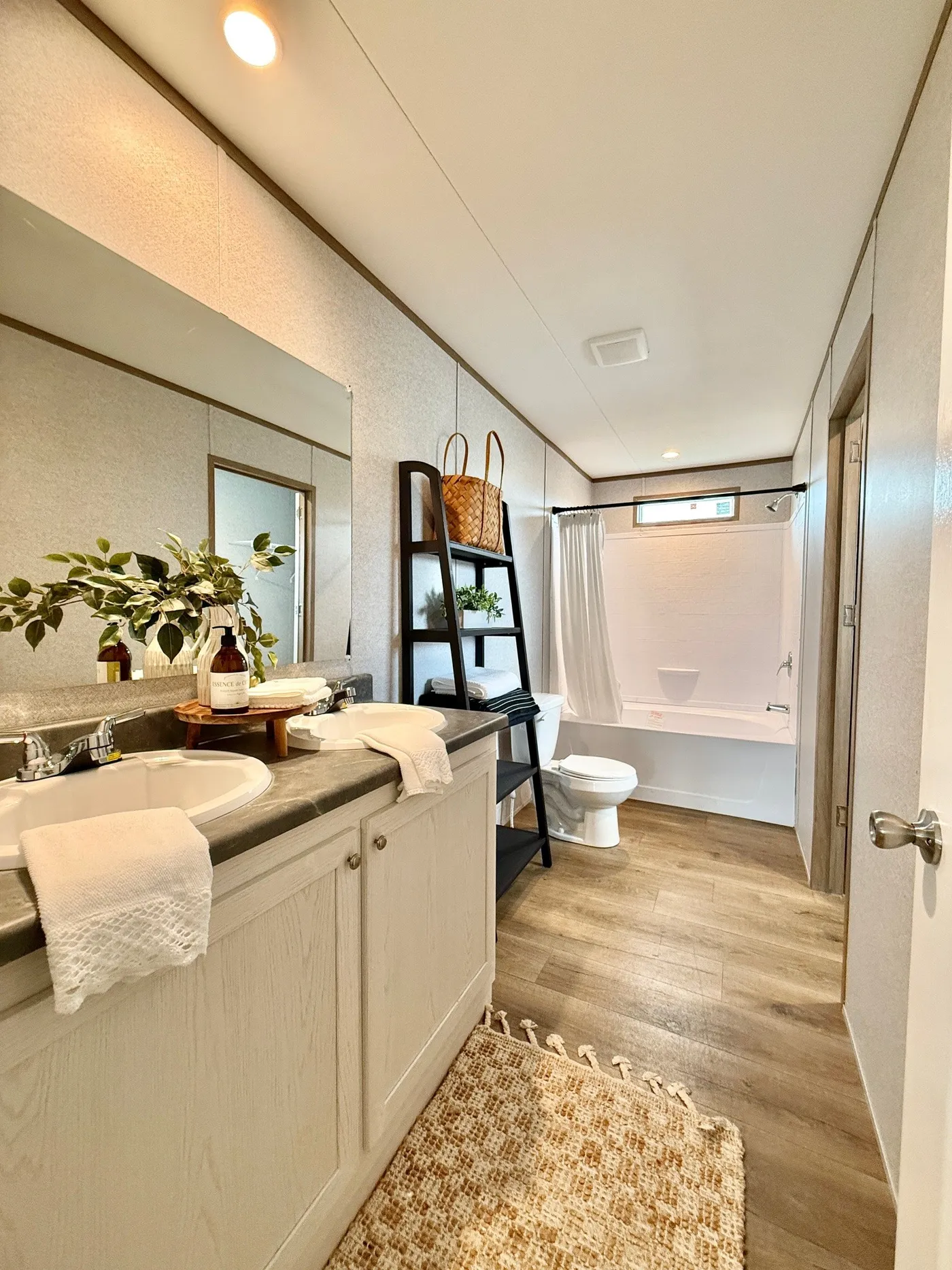 This beautiful primary bathroom features double sinks, plenty of counter space, and a relaxing tub/shower combo, giving you the perfect place to start and end your day.

The bright layout and modern finishes make the space feel fresh, open, and easy to enjoy every day.
