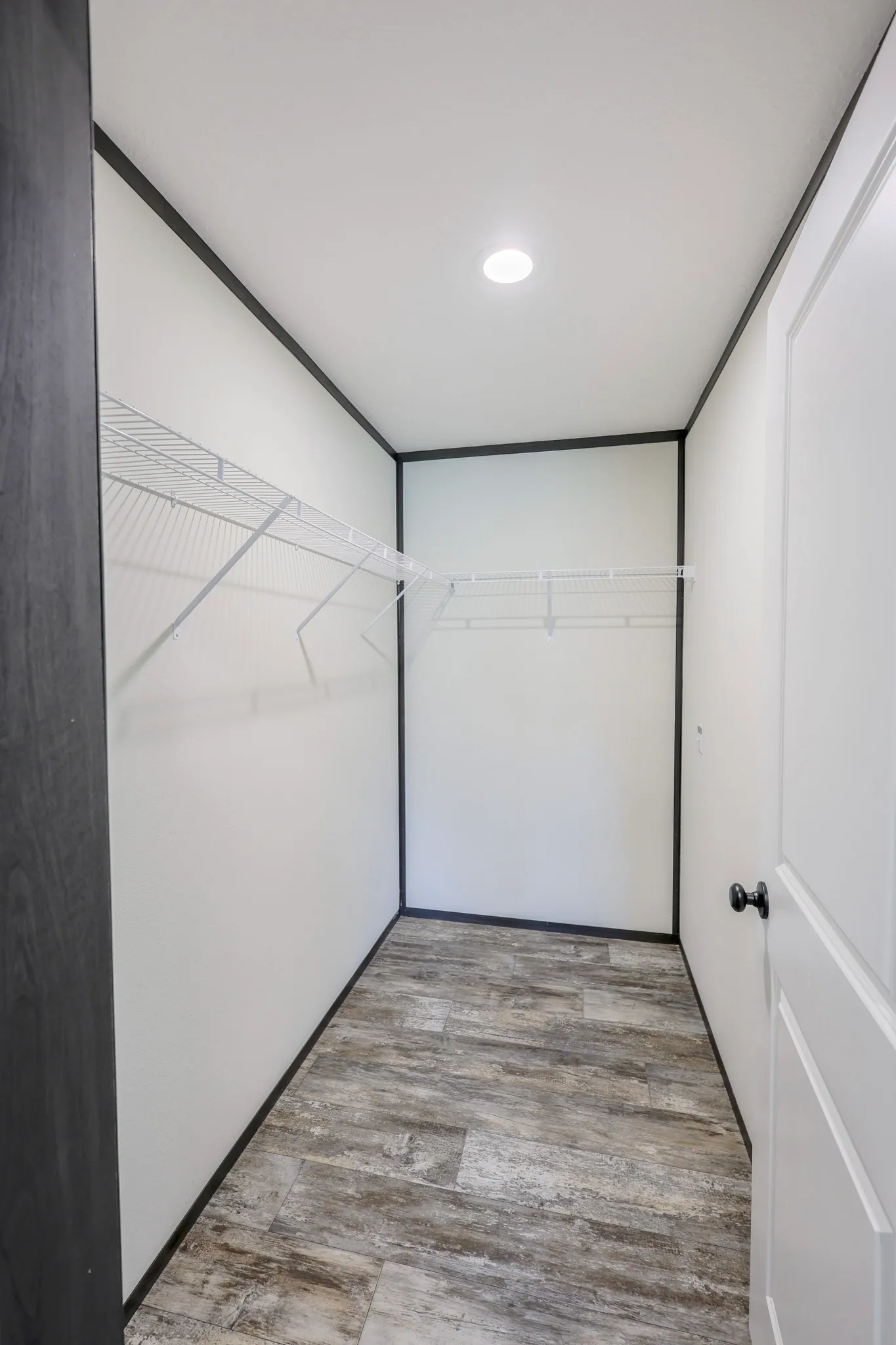 primary bedroom walk-in closet