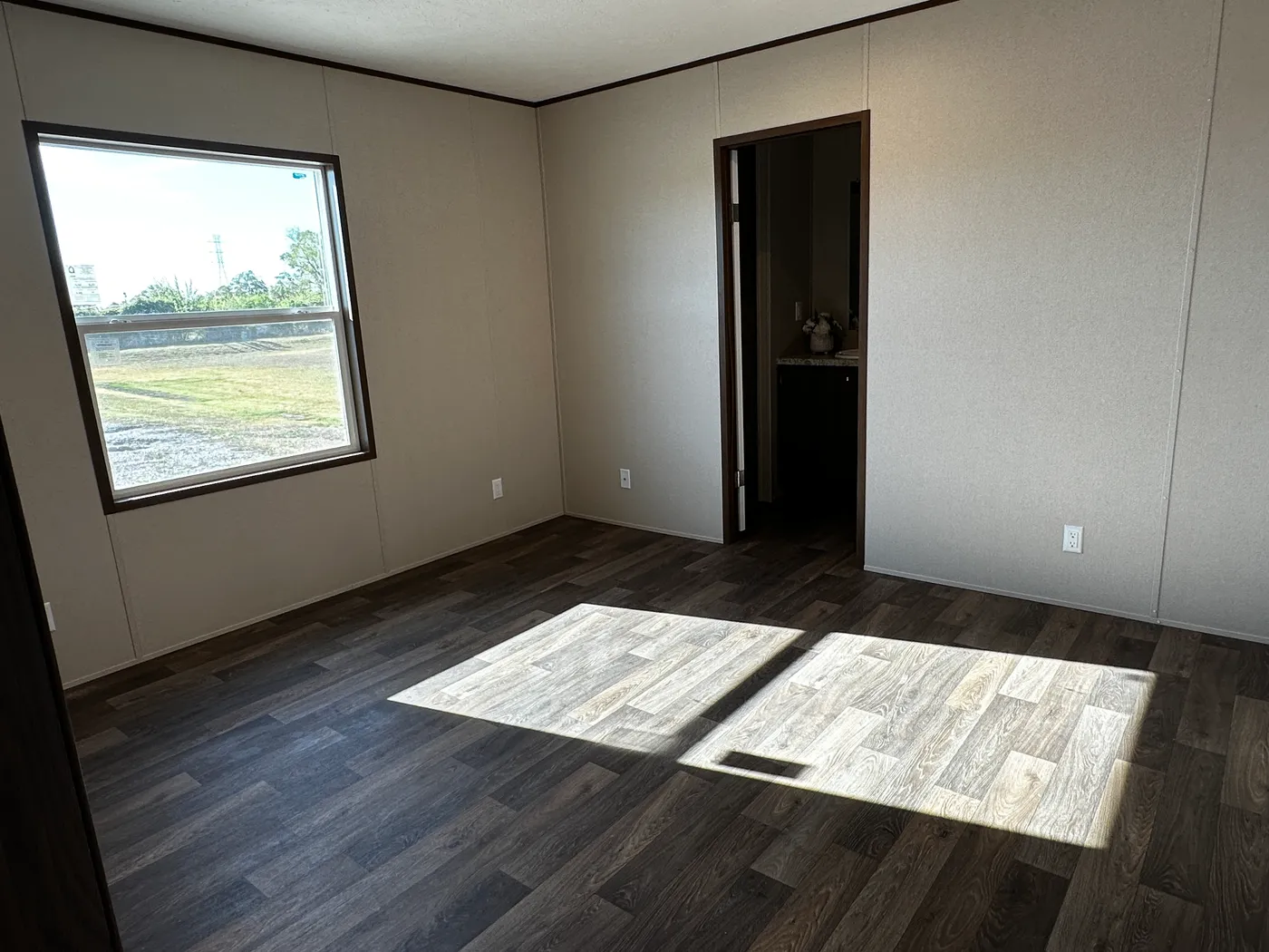 Discover the best value in affordable housing with this spacious 3 bedroom, 2 bath manufactured home, one of the largest and most affordable floor plans available. Designed for comfort and functionality, this energy-efficient mobile home features a large open layout, spacious bedrooms, and modern living areas perfect for families. The kitchen comes fully equipped with a refrigerator, stove, and dishwasher, making move-in easy and convenient. Built for efficiency and long-term savings, this home 