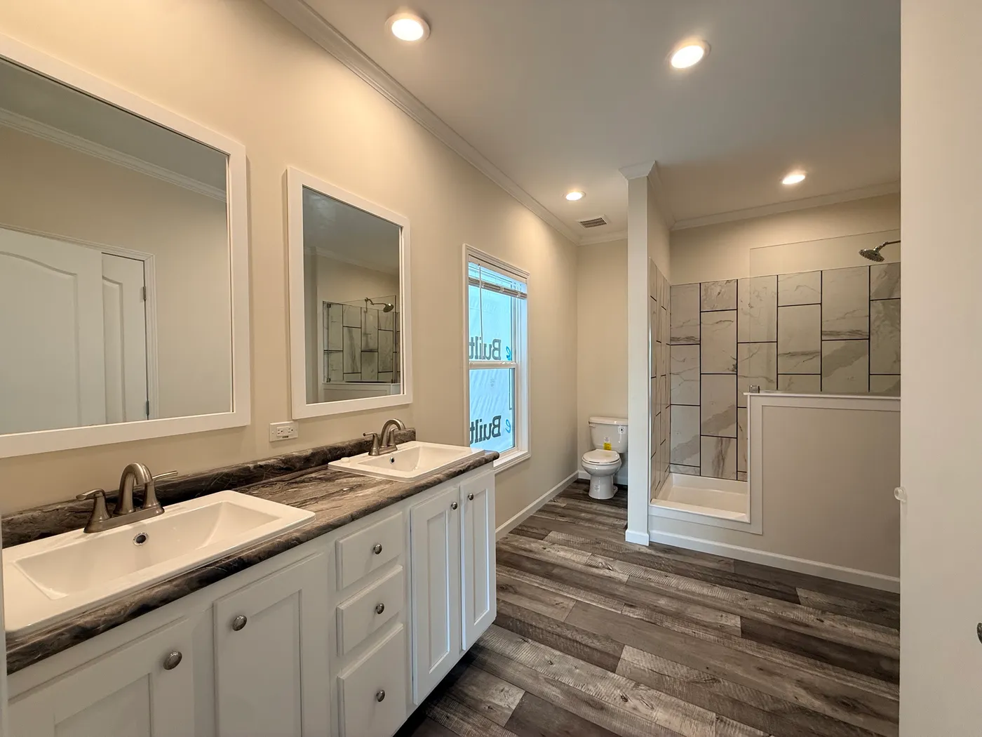 Double sinks and Tiled Shower
