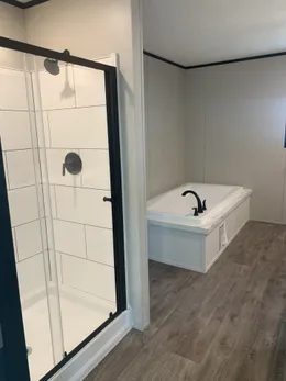 Primary bath  - Large walk in shower, complemented by oversized garden tub.  