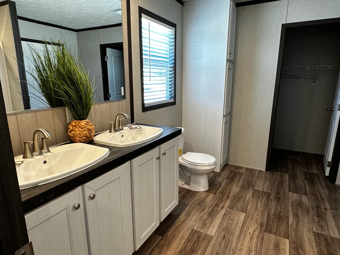 extra wide doublewide mobile home, 32x52 manufactured home, SmartPanel siding mobile home, open floorplan manufactured home, energy-efficient doublewide, walk-in shower mobile home, walk-in closet master bedroom, spacious manufactured home for sale.
