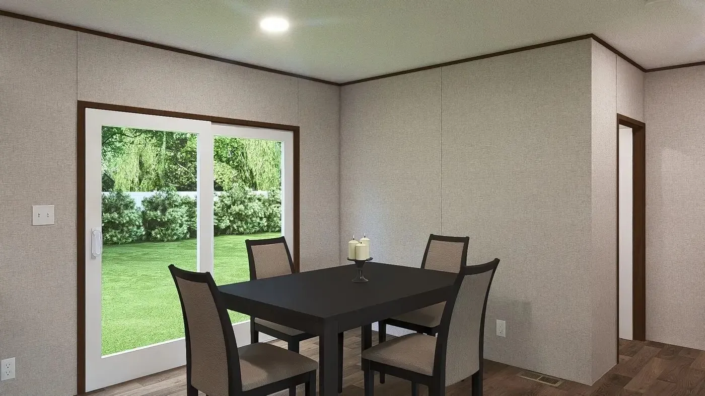 Dining room with sliding glass door to back deck. Perfect for grilling.