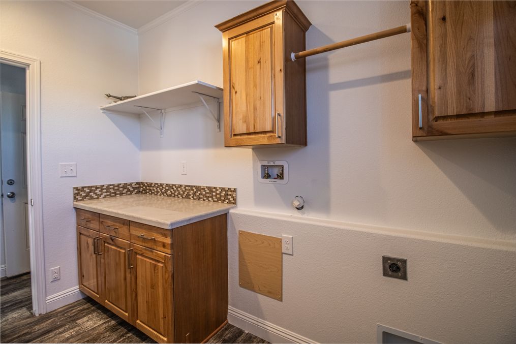 Well-appointed laundry room. 