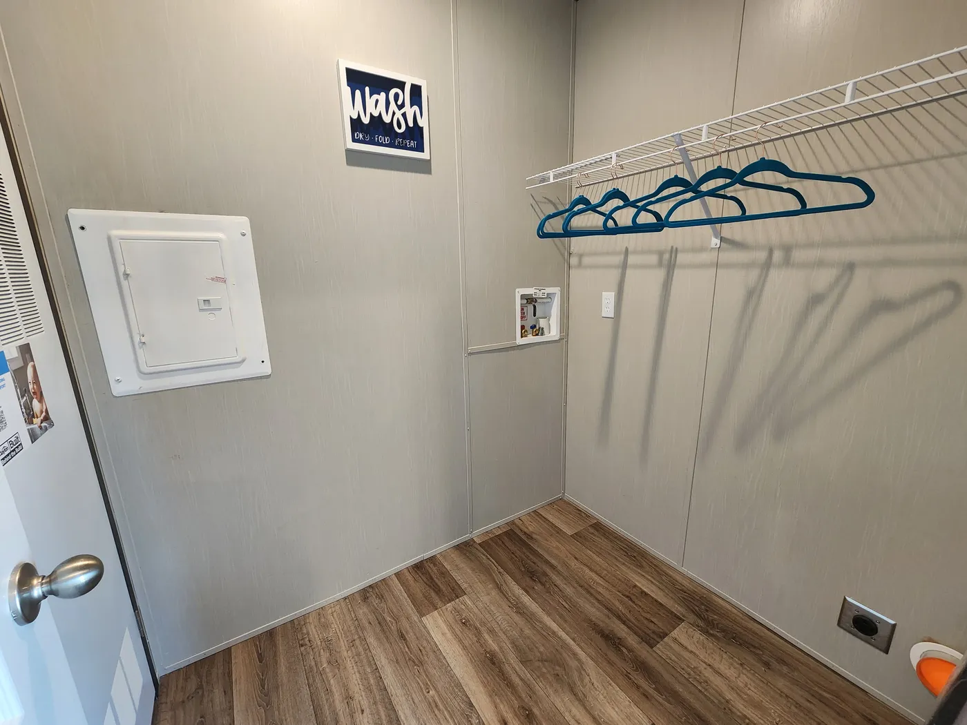 Utility room with built in shelf for storage 