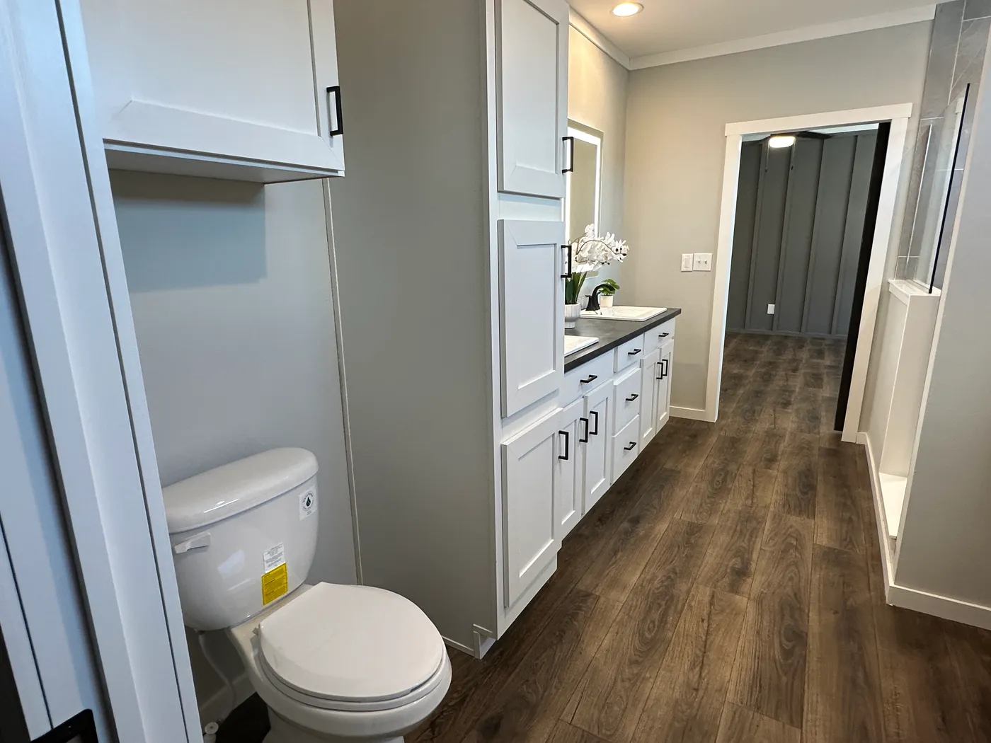 Step inside one of the most beautiful 4 bedroom, 3 bathroom tape and textured doublewide manufactured homes on the market. This stunning home is designed with upscale finishes, open living space, and modern comfort throughout. The spacious living room features vaulted ceilings, elegant crown moulding, and a built-in fireplace that creates a warm, high-end feel the moment you walk in.

The kitchen is loaded with premium features, including quartz countertops, stainless steel appliances, and a s