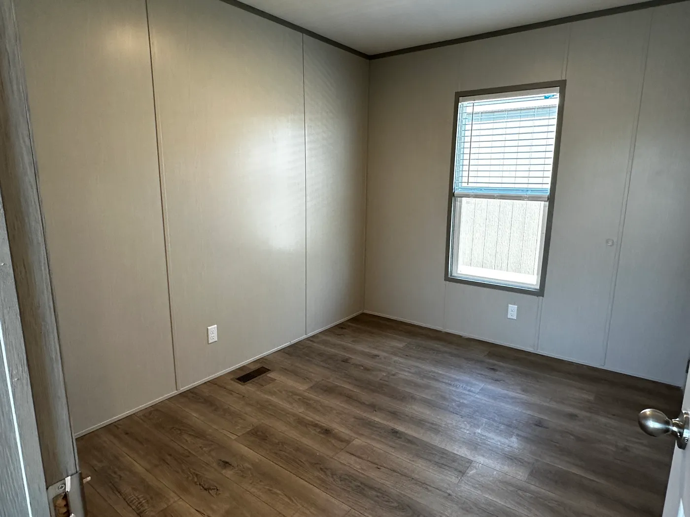 Affordable luxury meets modern comfort in this 3 bedroom, 2 bathroom manufactured home designed for spacious living and energy efficiency. The open-concept layout features a stylish kitchen with stainless steel appliances and a large walk-in pantry for extra storage. The private primary suite includes a generous walk-in closet and a relaxing retreat feel. Enjoy improved comfort with ceiling air vents for better airflow and temperature control throughout the home. This energy-efficient home offer