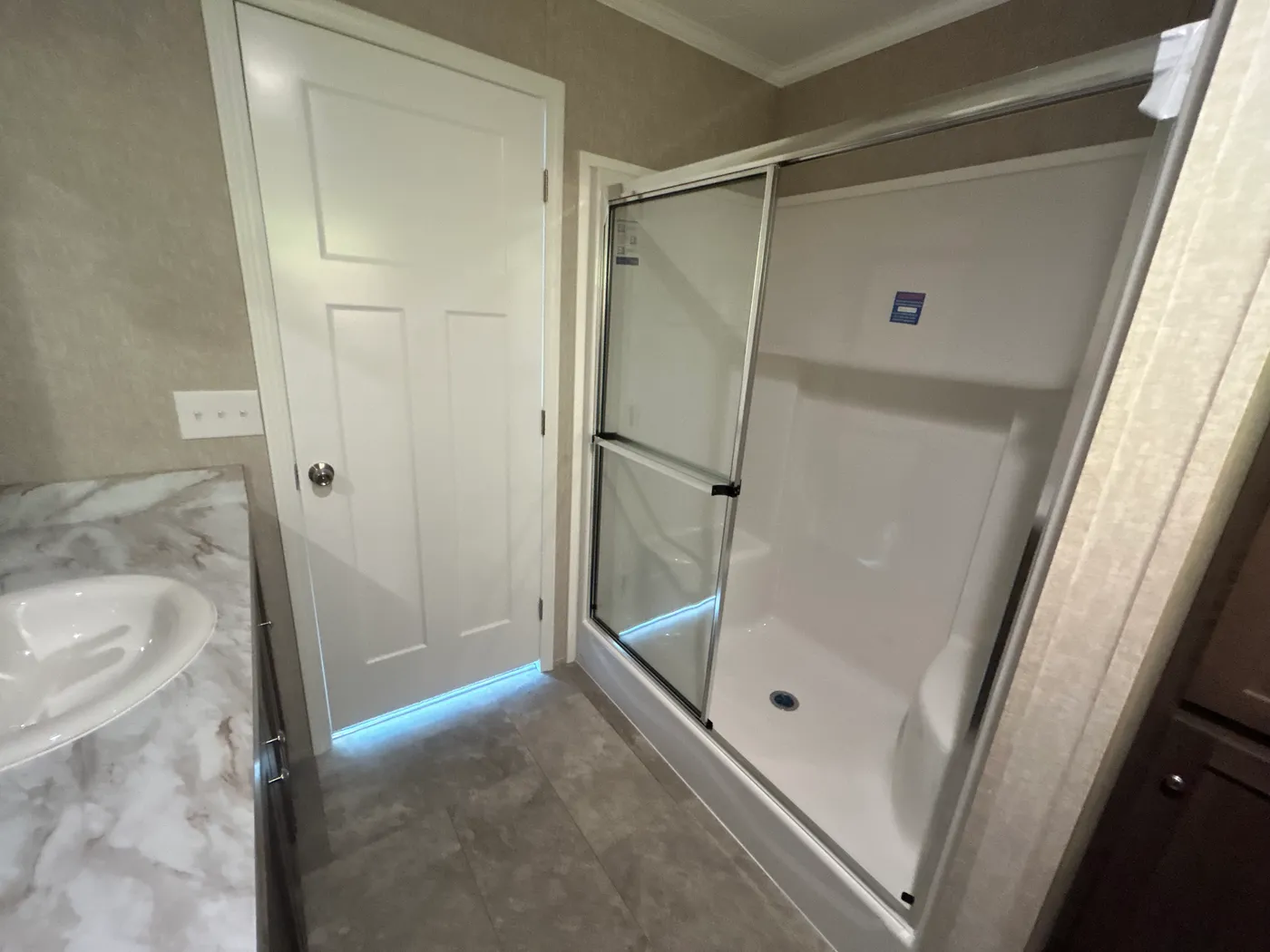 Another view of the shower in the primary bathroom. 