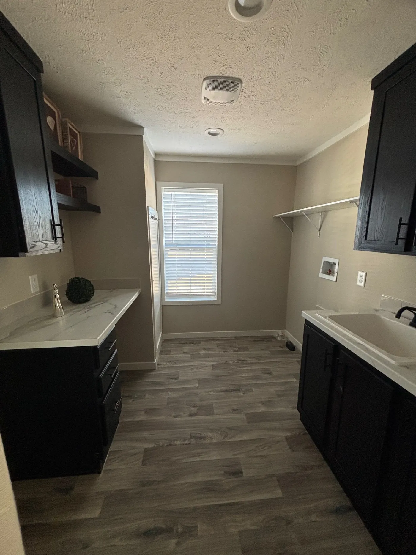 Laundry room with built in desk