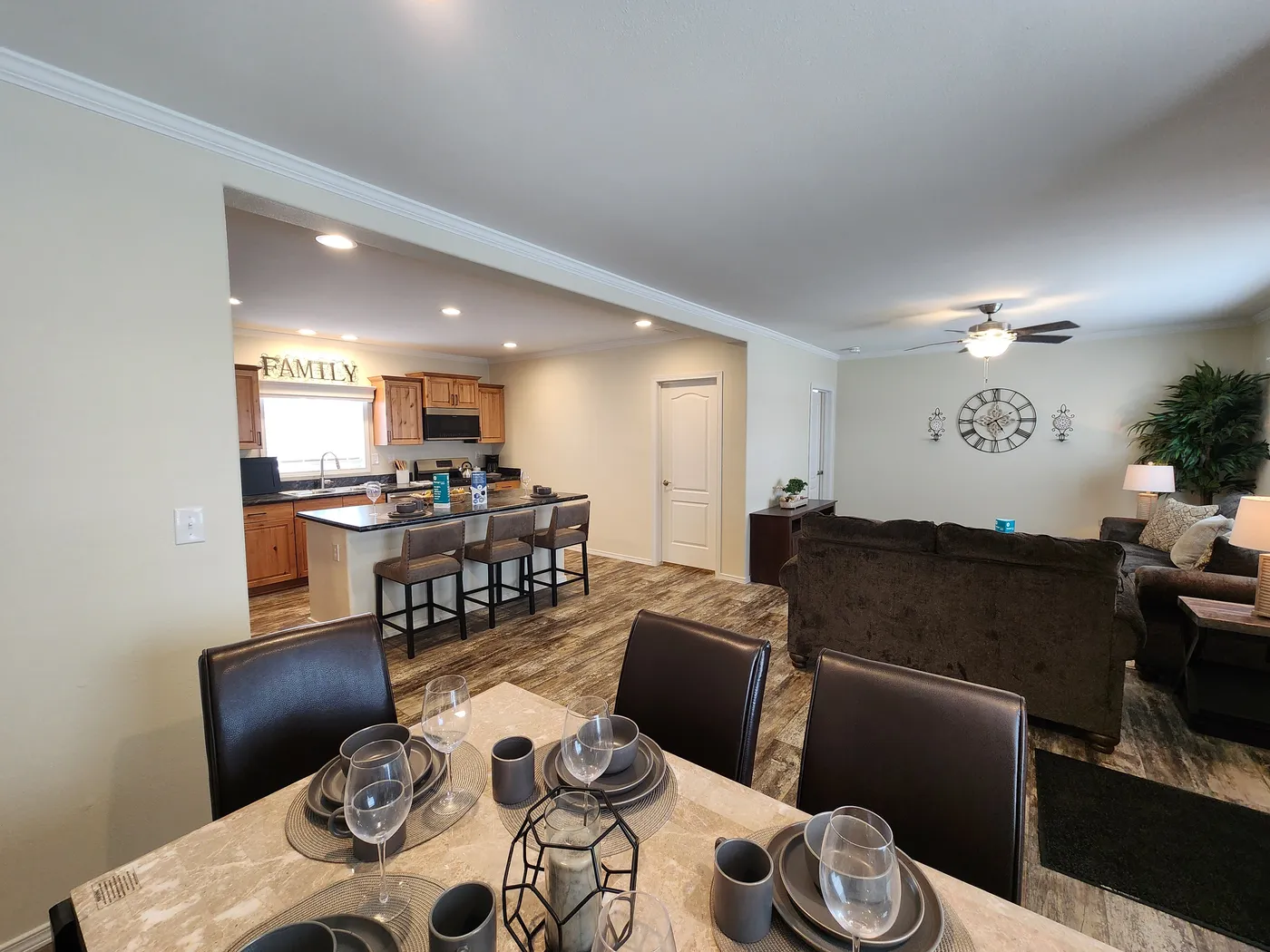 Open concept living area, dining room and kitchen.