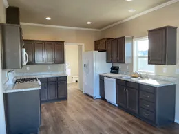 Large kitchen has lots of countertop and cabinet space