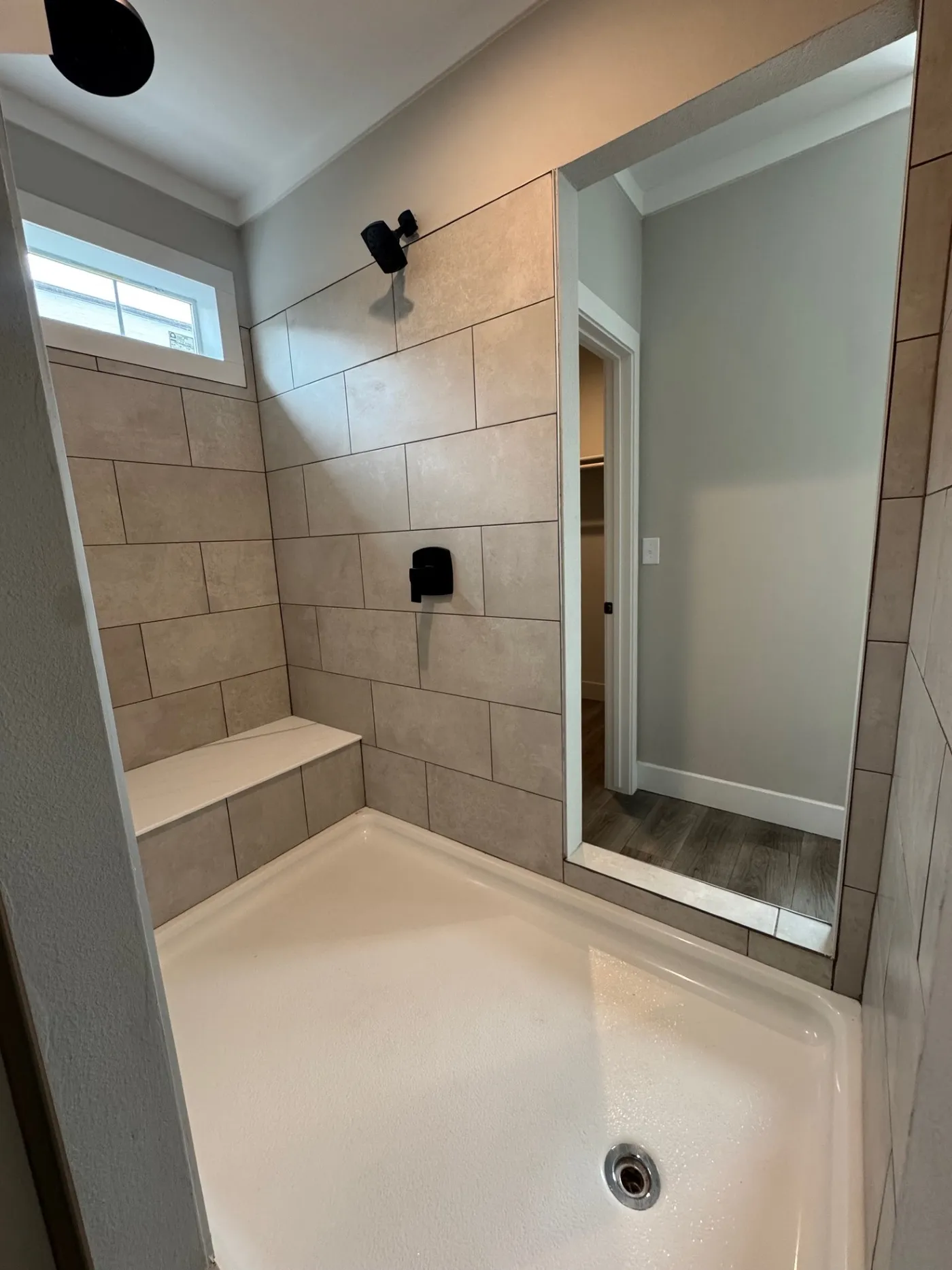 HUGE walk-in / walk-through tile shower with seat