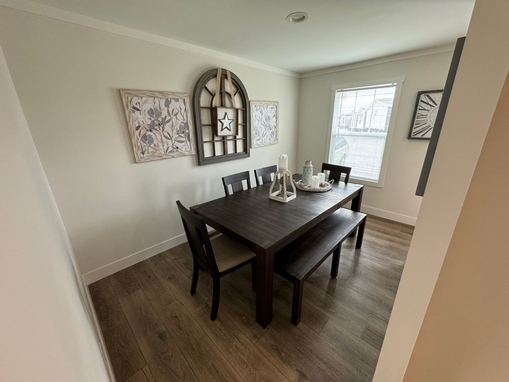 Located directly off the kitchen. Perfect for dining, homework, office area, gaming and more!
