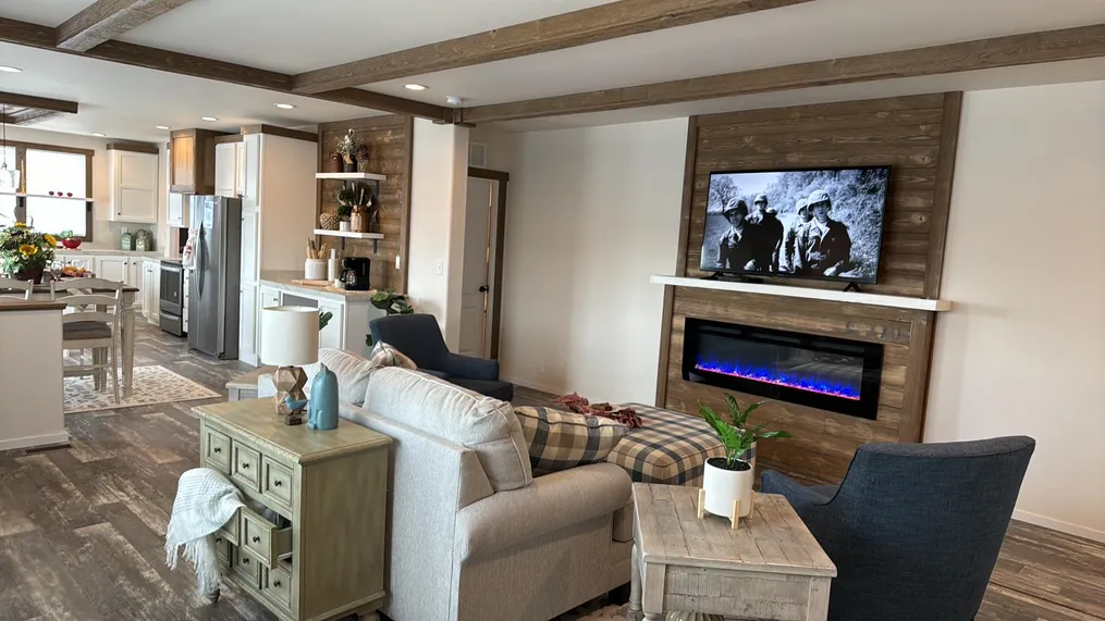 Open concept with remote controlled electric fireplace.