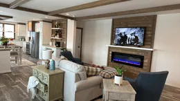 Open concept with remote controlled electric fireplace.