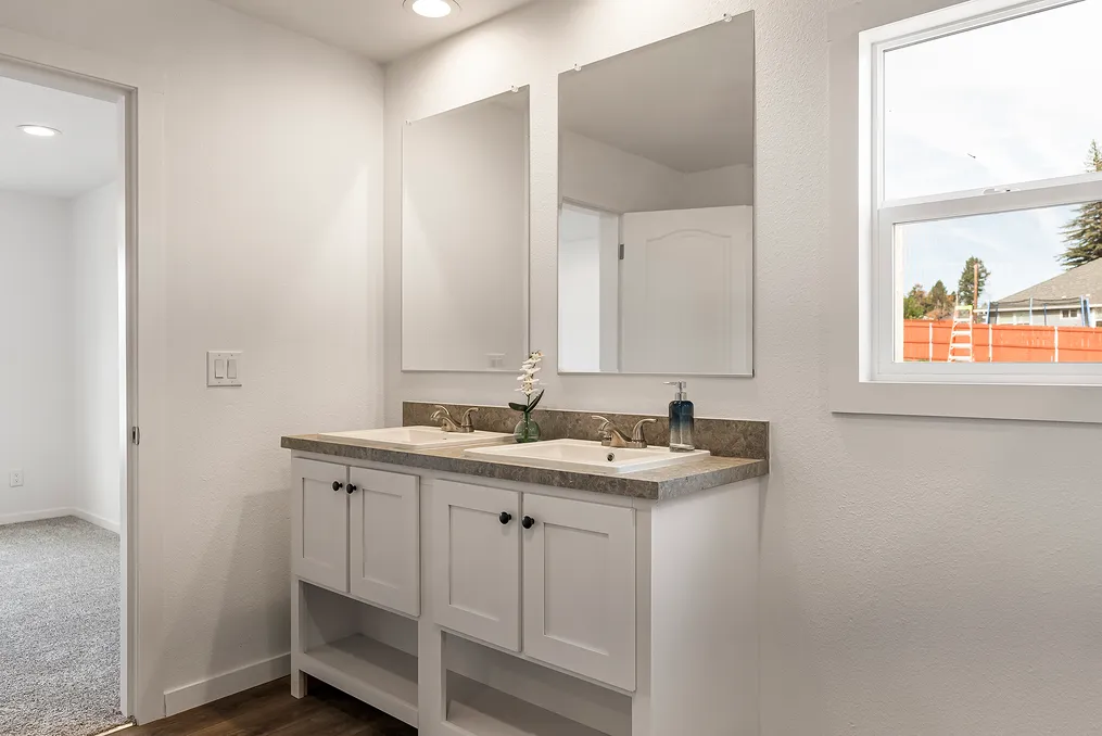 Double sinks and window for natural light