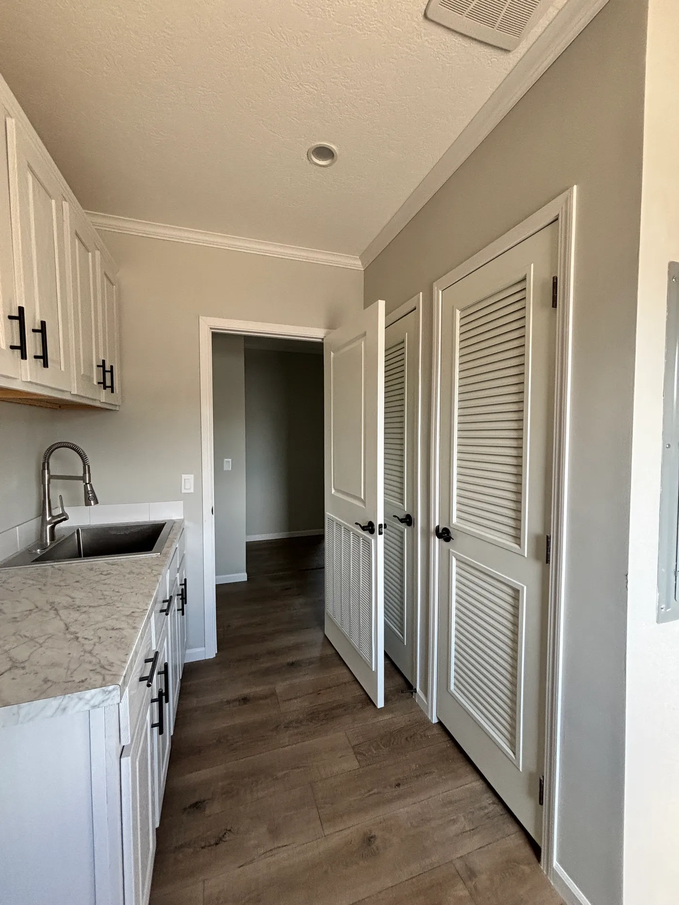 Spacious utility room with sink