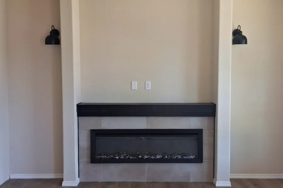 Built in entertainment center with electric fireplace.