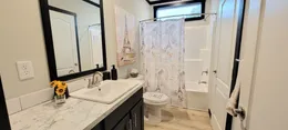 Second full bath off utility room.