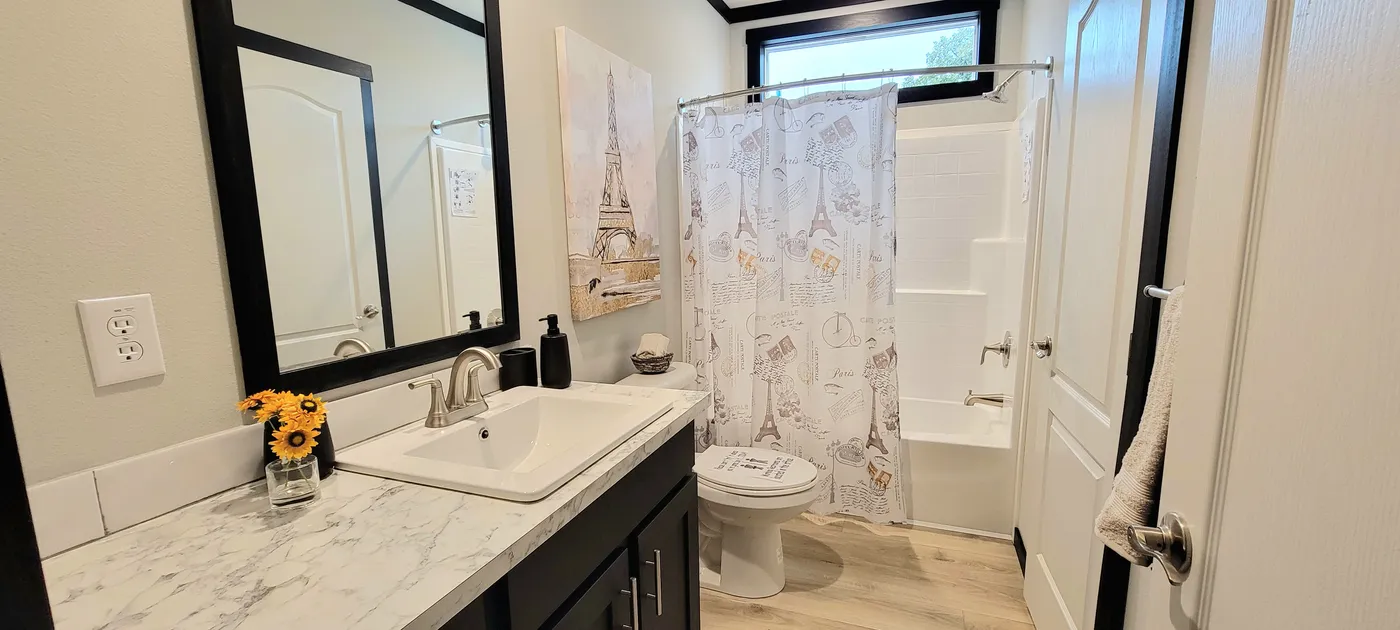 Second full bath off utility room.