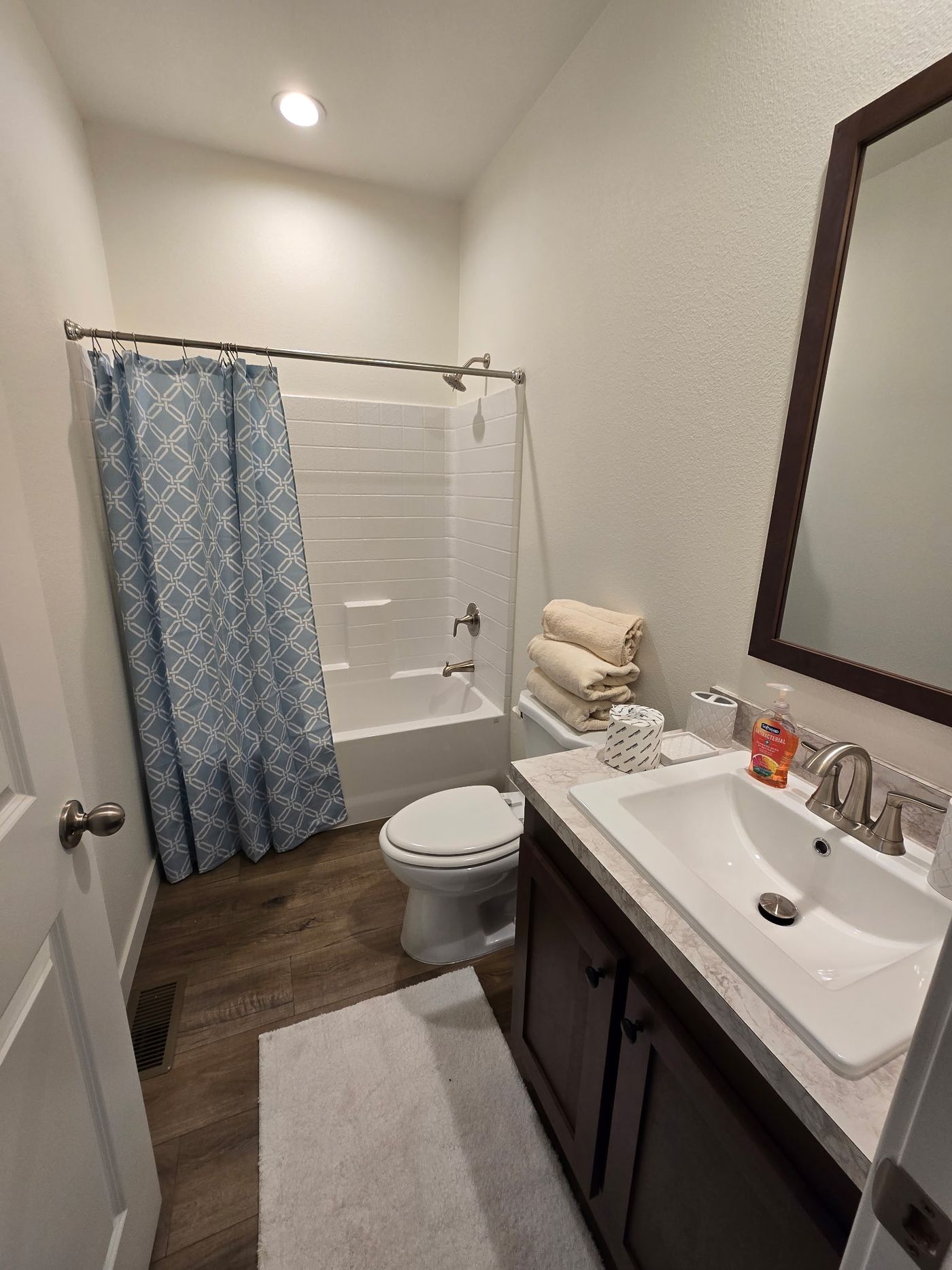 This spare bathroom is thoughtfully designed to be both practical and inviting for guests or everyday use. The clean, functional layout offers comfortable space to move, with a bright and fresh feel that enhances the overall ambiance. Neutral finishes provide a timeless look, making it easy to complement any décor style. Ideal for family or visitors, this bathroom delivers convenience and comfort while maintaining a polished, well-kept appearance.