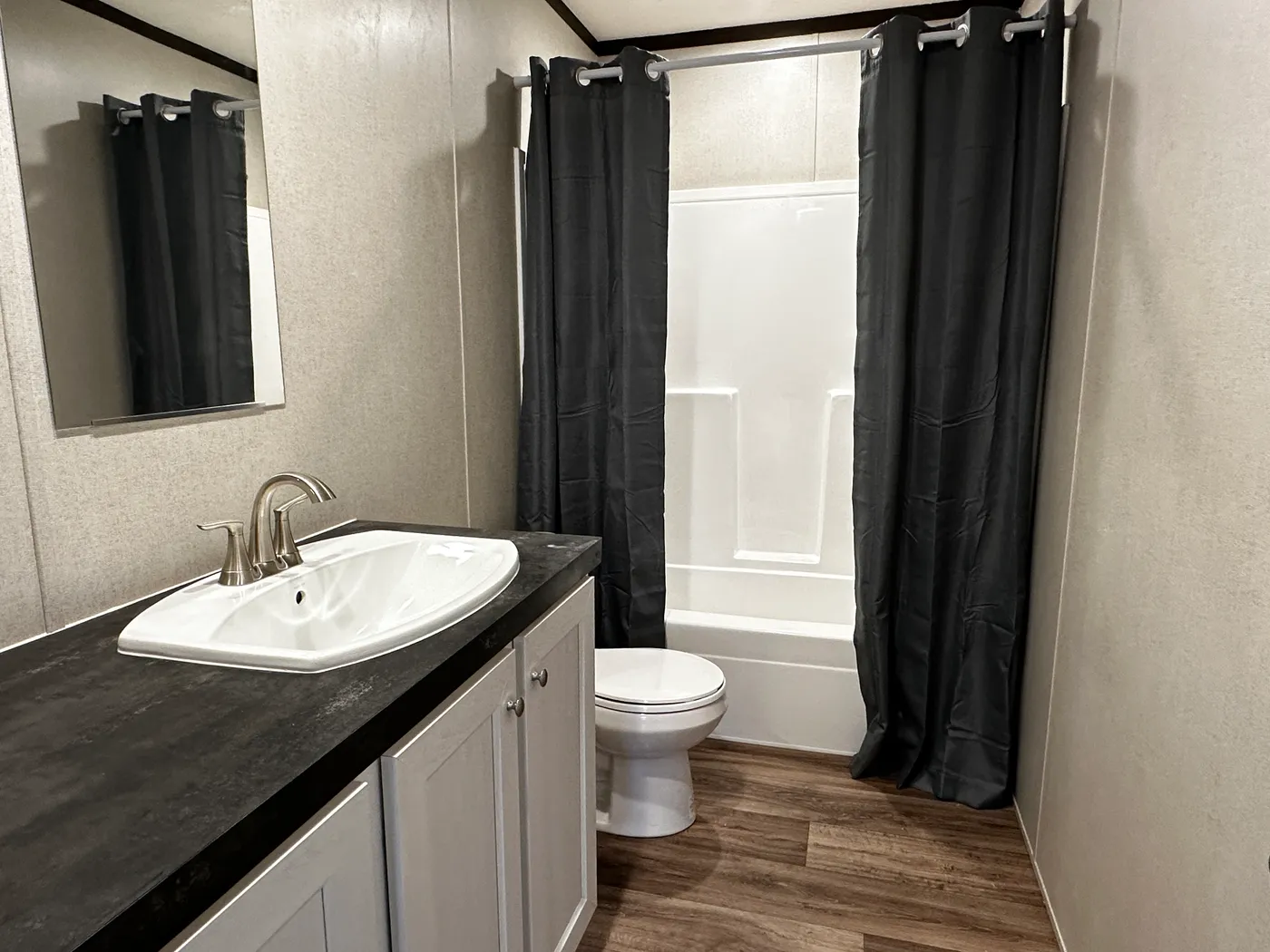 extra wide doublewide mobile home, 32x52 manufactured home, SmartPanel siding mobile home, open floorplan manufactured home, energy-efficient doublewide, walk-in shower mobile home, walk-in closet master bedroom, spacious manufactured home for sale.
