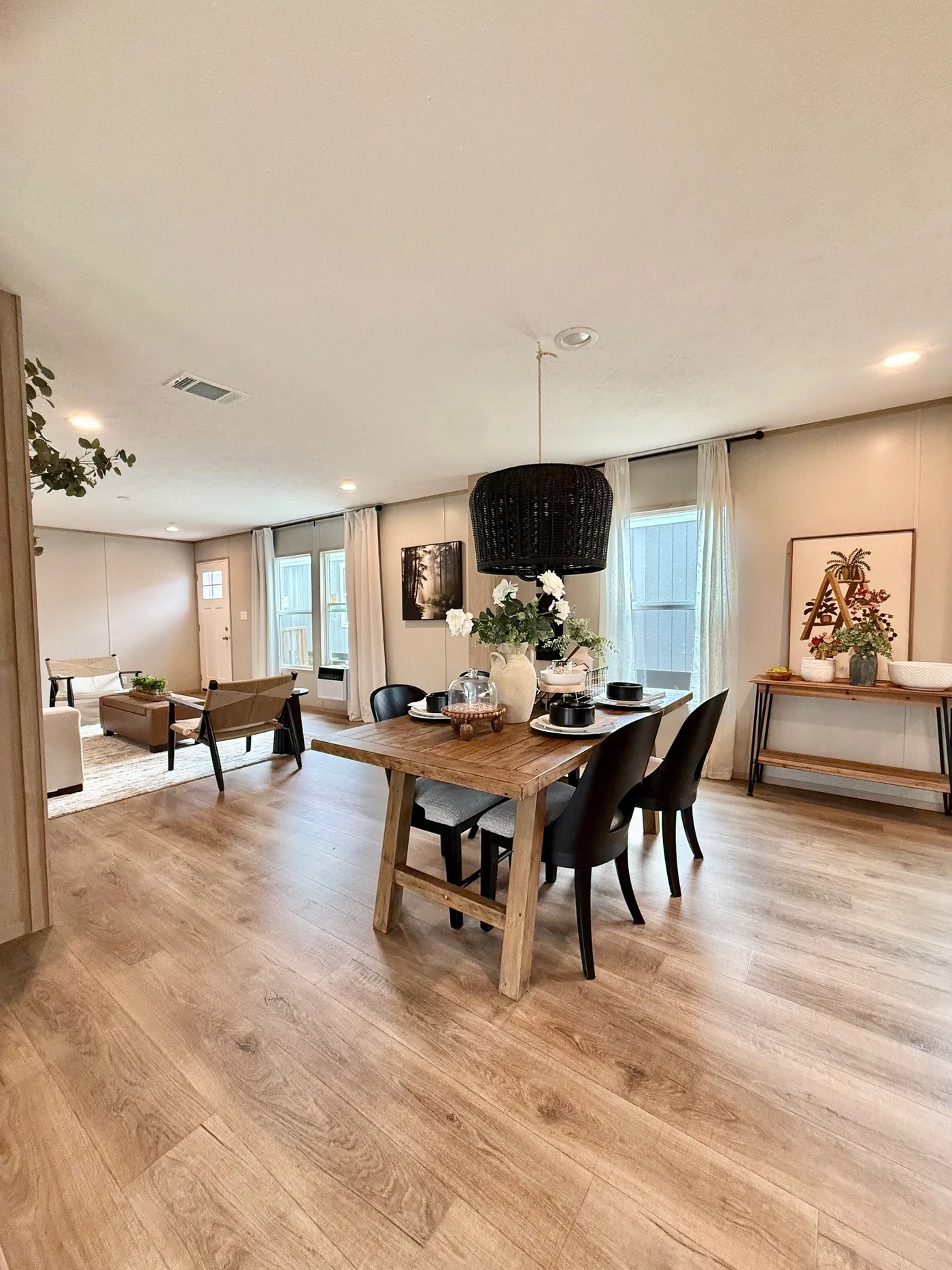 Imagine starting your mornings right here…
This beautiful open-concept dining and kitchen space is perfect for family dinners, entertaining guests, or enjoying your morning coffee with natural light pouring in