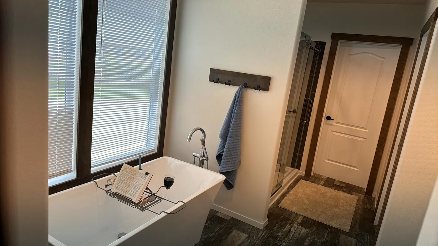 Oversized free-standing tub with separate 72" shower.