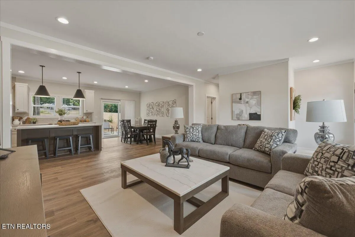 Friends and family con interact from the Living Room, Kitchen and Dining room.