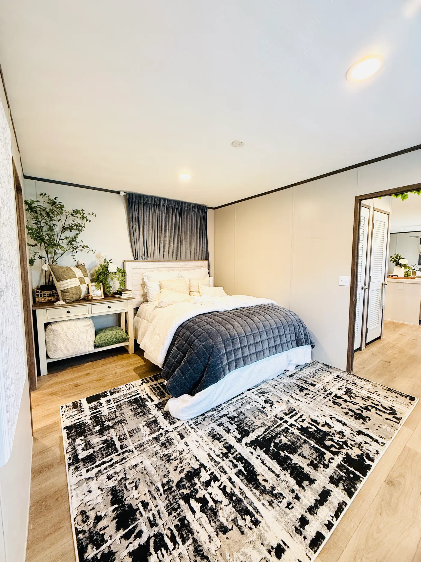 This cozy bedroom offers a peaceful place to relax at the end of the day. The clean finishes, warm flooring, and natural light create a space that feels calm and inviting.

The layout gives you plenty of room for a full bedroom setup while still keeping the space comfortable and functional.