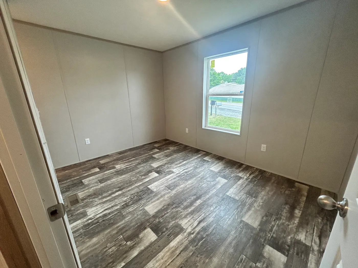 A view of the guest bedroom. (Closet storage not shown.) 