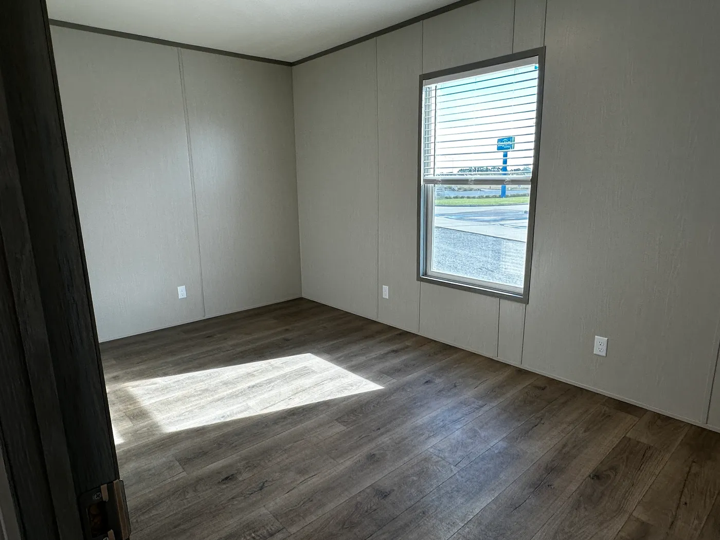 Affordable luxury meets modern comfort in this 3 bedroom, 2 bathroom manufactured home designed for spacious living and energy efficiency. The open-concept layout features a stylish kitchen with stainless steel appliances and a large walk-in pantry for extra storage. The private primary suite includes a generous walk-in closet and a relaxing retreat feel. Enjoy improved comfort with ceiling air vents for better airflow and temperature control throughout the home. This energy-efficient home offer