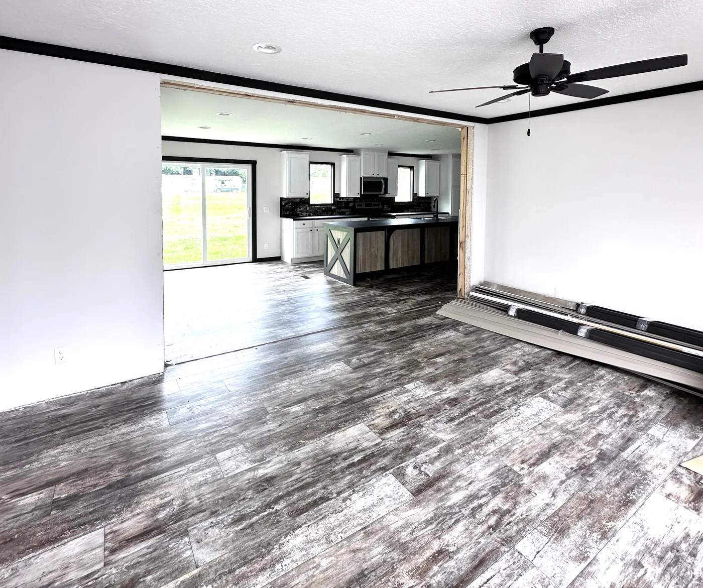Large Living Room opening into the Spacious Kitchen