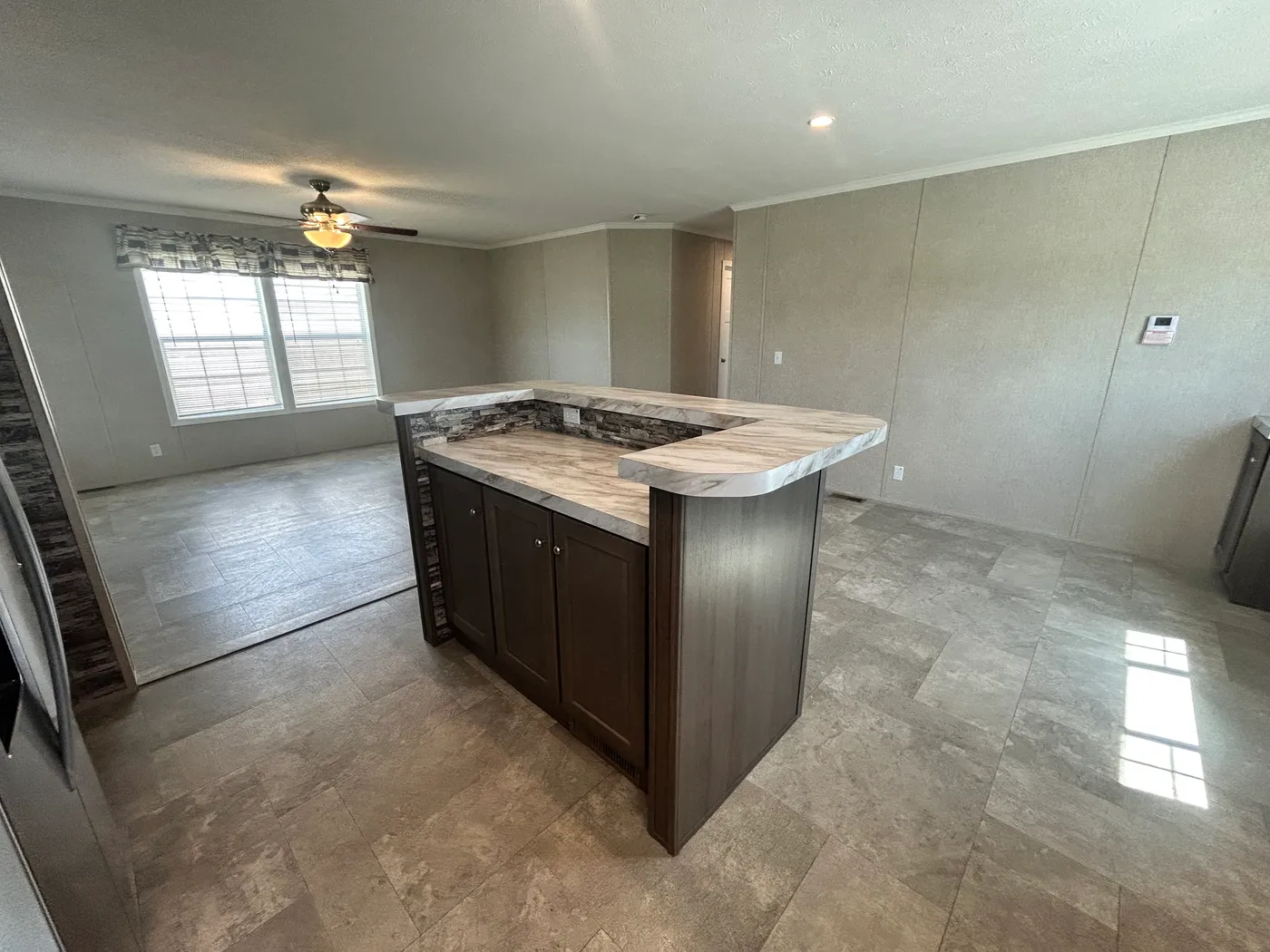 This kitchen island is the center piece to this open concept floorplan. More storage than you will ever need! 