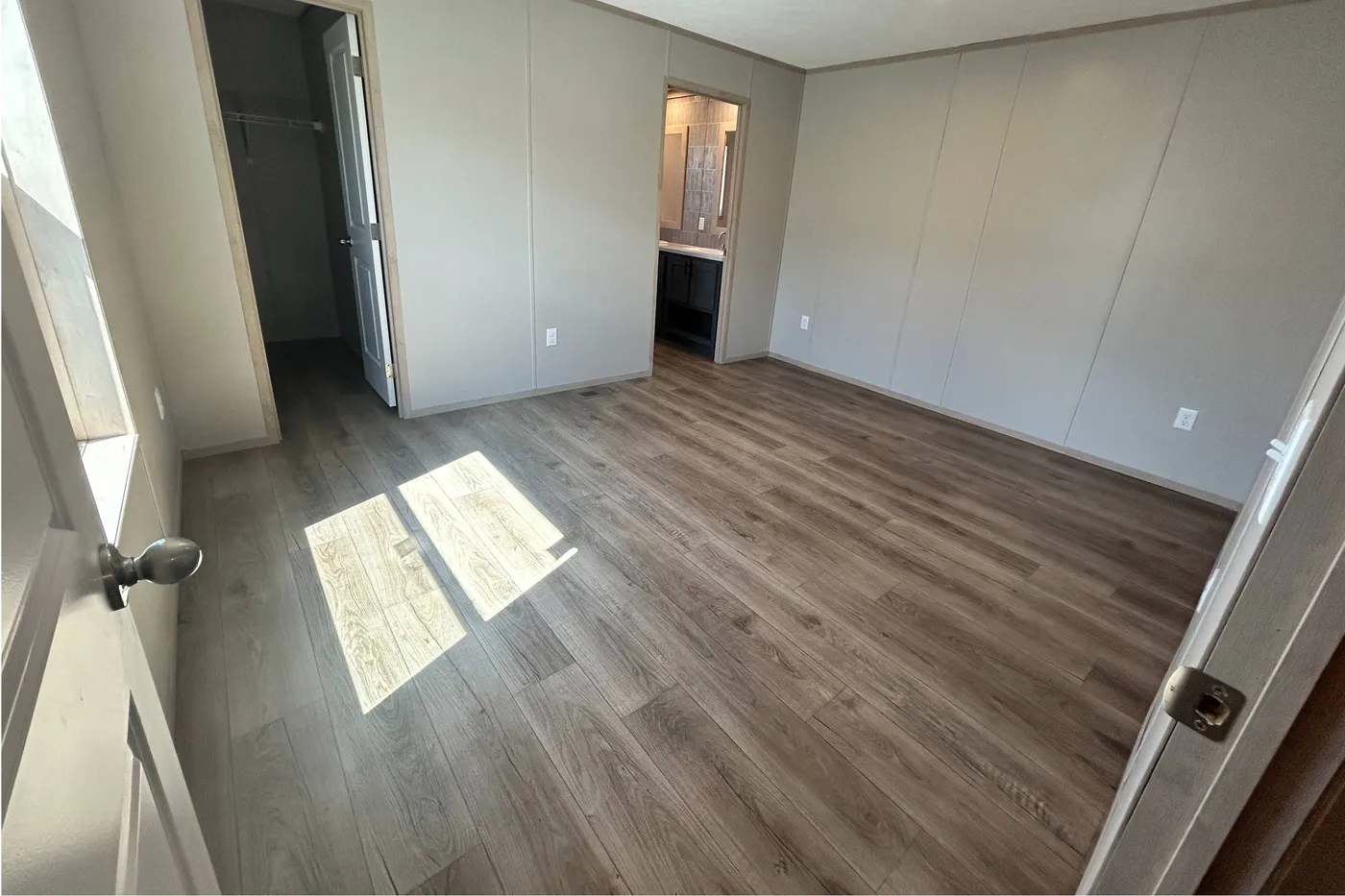 Entry to the main bathroom and closets featured above! 