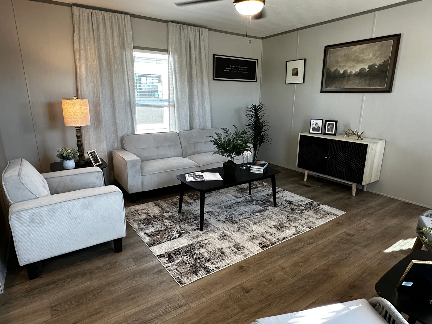 Affordable luxury meets modern comfort in this 3 bedroom, 2 bathroom manufactured home designed for spacious living and energy efficiency. The open-concept layout features a stylish kitchen with stainless steel appliances and a large walk-in pantry for extra storage. The private primary suite includes a generous walk-in closet and a relaxing retreat feel. Enjoy improved comfort with ceiling air vents for better airflow and temperature control throughout the home. This energy-efficient home offer