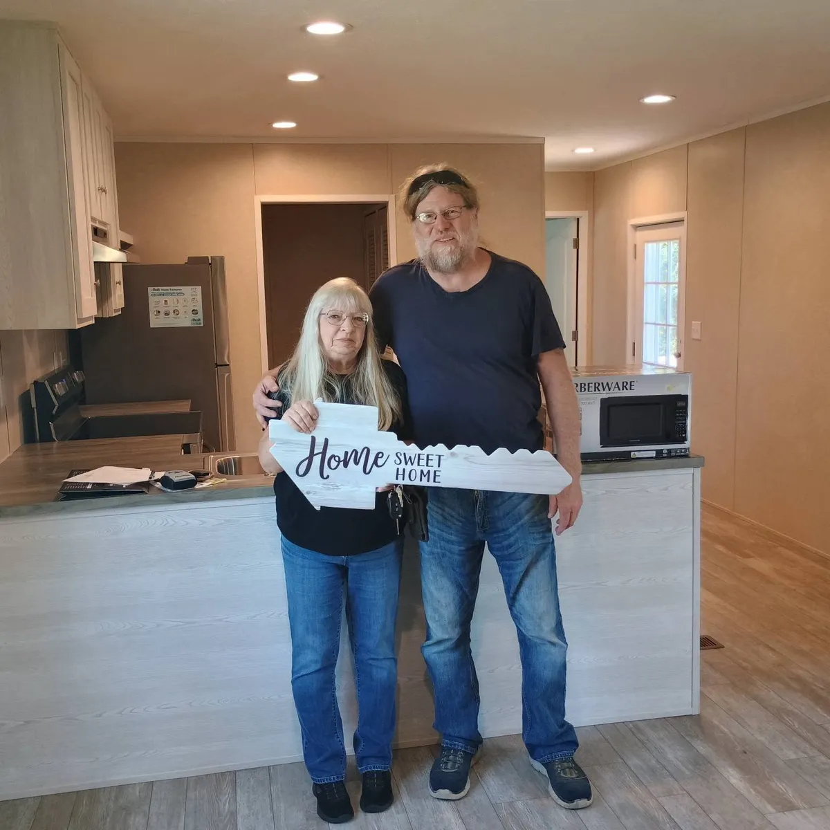 John E. welcome home image