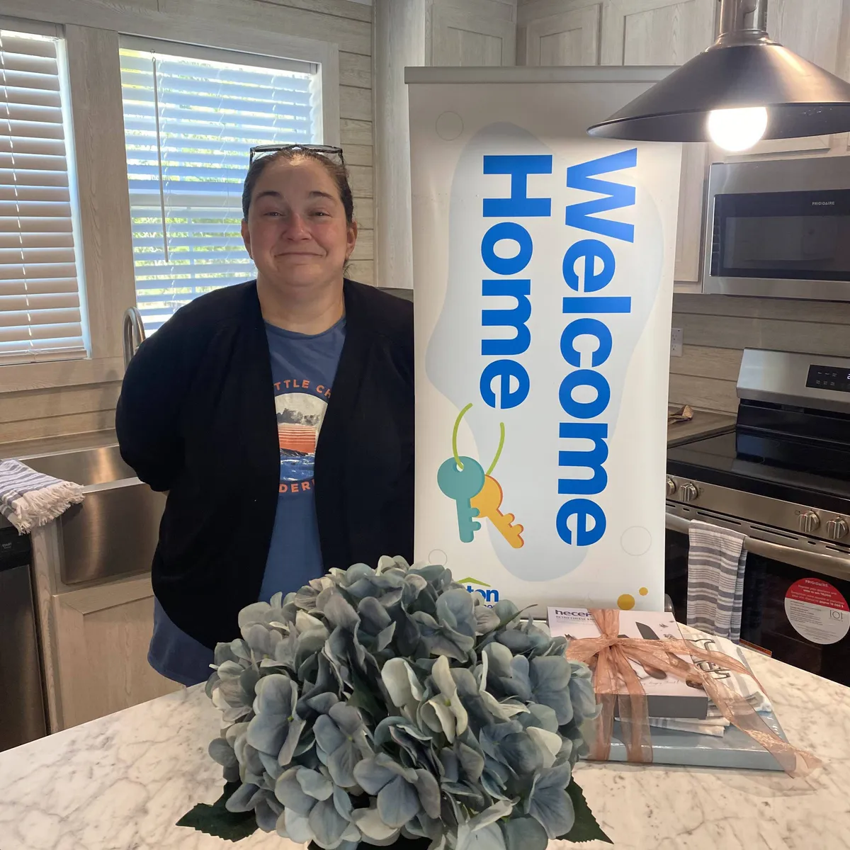 MEGAN G. welcome home image